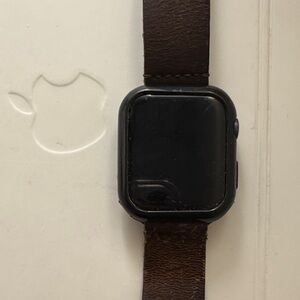Apple Smartwatch series 6 44mm with Brown leather band.